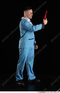 MIKAEL STANDING POSE WITH RED PISTOL